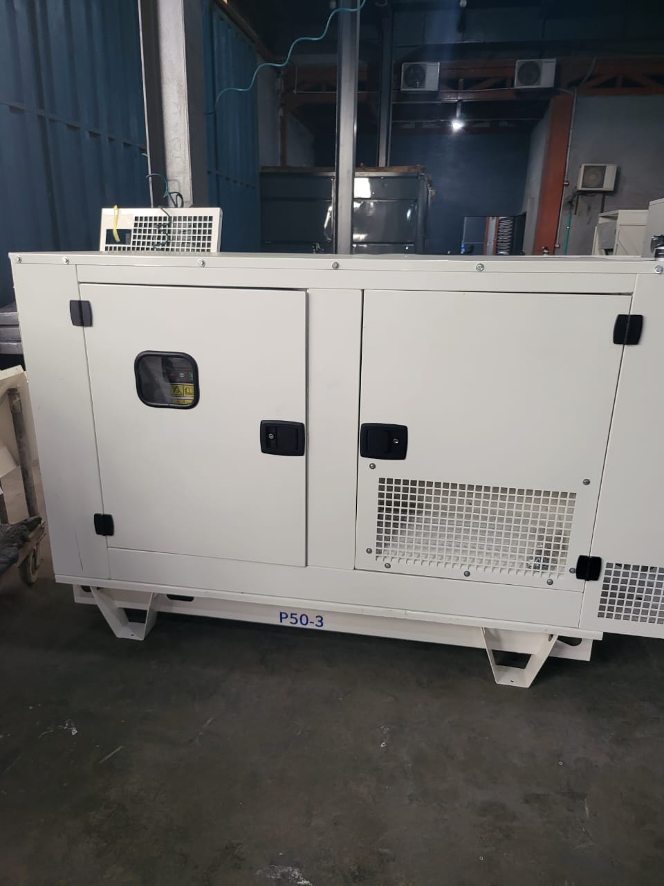 FG Wilson P50 45 kVA diesel generator in a white soundproof canopy